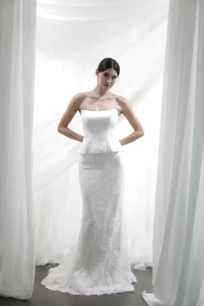 Aphrodite two-piece bridal look with strapless satin peplum top and lace skirt