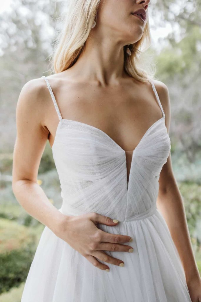 Pleated tulle sweetheart bodice A-line gown with beaded straps by Wedding Societe